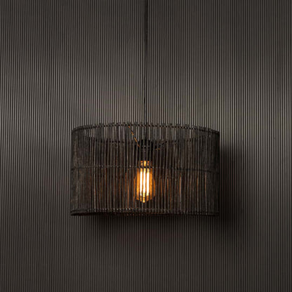 Orbit Rattan Pendant Lamp Light On Black Background