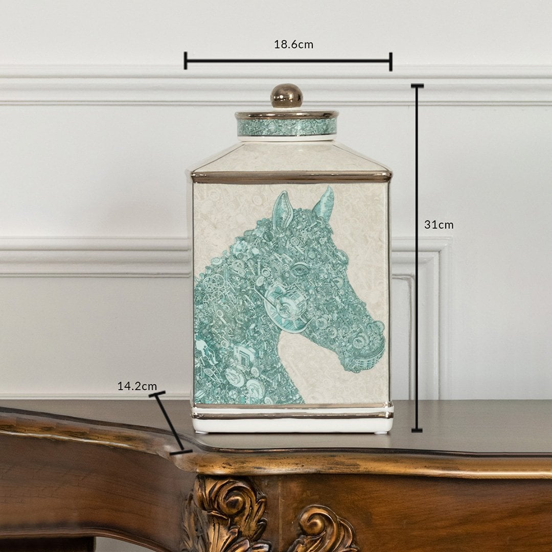 White ceramic decorative jar with turquoise horse illustration and silver lid for contemporary shelf styling and home decor.