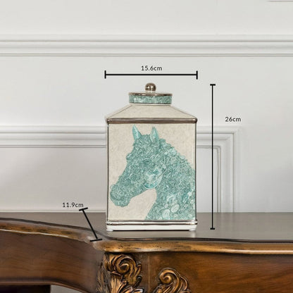 White square ceramic jar with green horse silhouette in a front view measuring 19.5 cm width and 29 cm height ideal for contemporary décor.