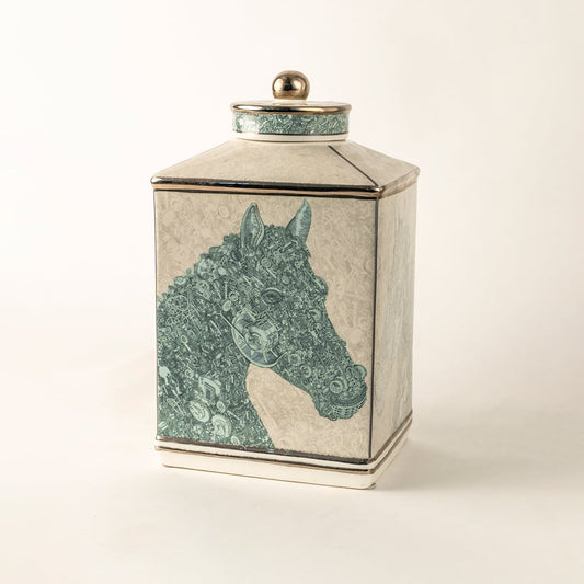 White ceramic jar with green horse silhouette design perfect for contemporary décor and stylish tabletop placement.