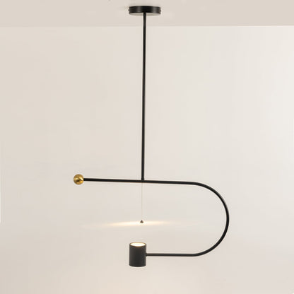 Black metal pendant linear light with curved sculptural form glowing softly against a clean white background showcasing refined modern interior home decor lighting style.