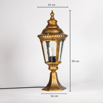 Golden pillar lamp with clear glass shown with dimensions height 50cm width 19cm base 16cm for outdoor gate and garden decor.