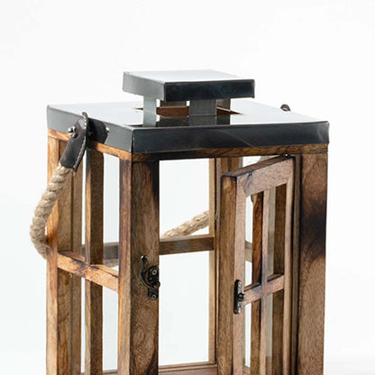 Detailed closeup of the wooden lantern showing fine craftsmanship smooth polished wood and clear glass panels offering a perfect blend of functionality and rustic elegance for ambient lighting.
