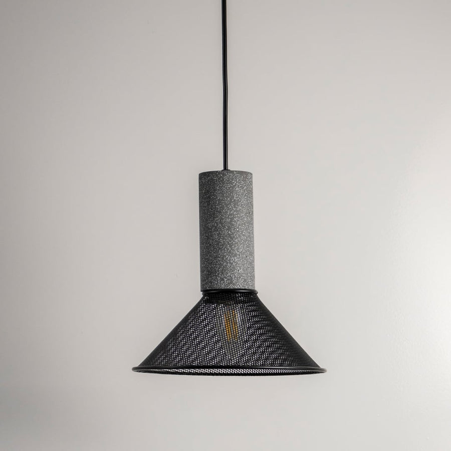 Black metal pendant light with smoky textured glass shade designed for dining and living spaces.