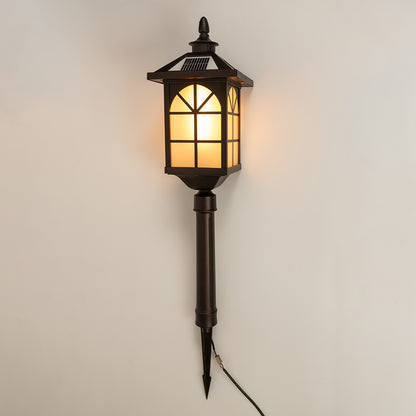 Vintage black outdoor wall light with warm glowing panels for elegant exterior decor styling use.