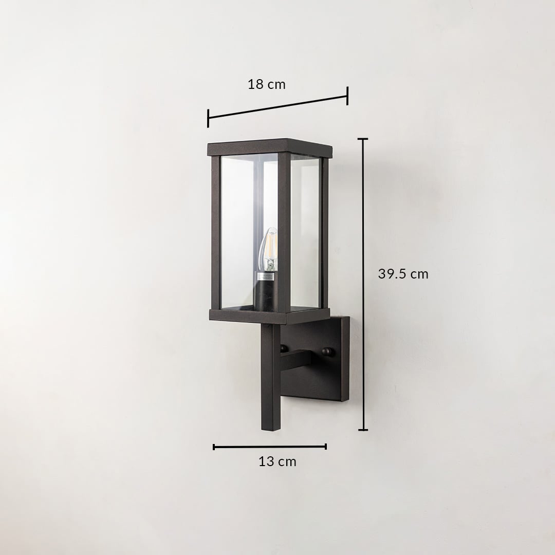 Outdoor wall light with black frame and glass shade shown with 39.5 cm height 18 cm width and 13 cm depth size.