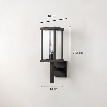 Outdoor wall light with black frame and glass shade shown with 39.5 cm height 18 cm width and 13 cm depth size.