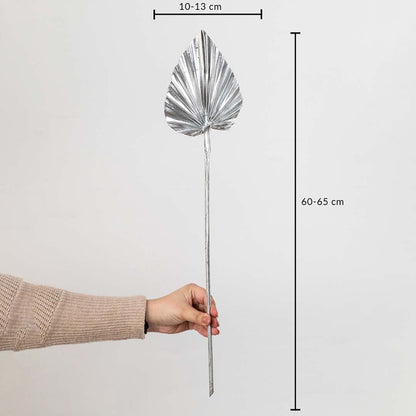 Silver dried palm leaf shown with size dimensions 60 to 65 cm height and 10 to 13 cm width for vase decor.