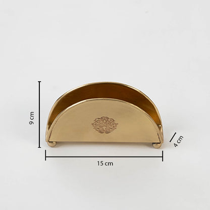 Brass napkin holder shown with labeled size 9 cm height 15.5 cm width and 4.5 cm depth on white background.