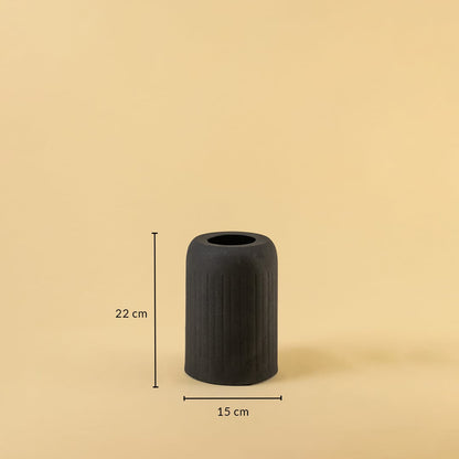 Black textured ceramic vase shown with 22 cm height and 15 cm width offering a clear size reference for decor use.
