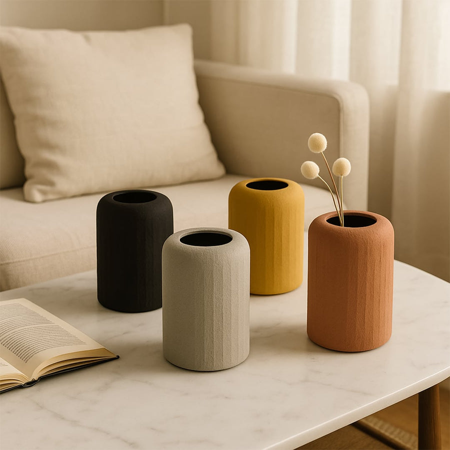 Terracotta textured ceramic vase styled in a warm neutral scene adding earthy charm to modern home decor settings.