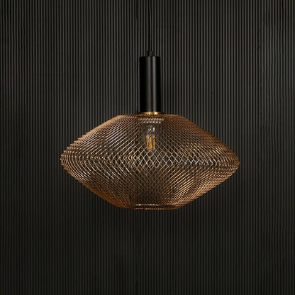 Gold metal mesh pendant light with black fixture adding modern elegance to interiors.