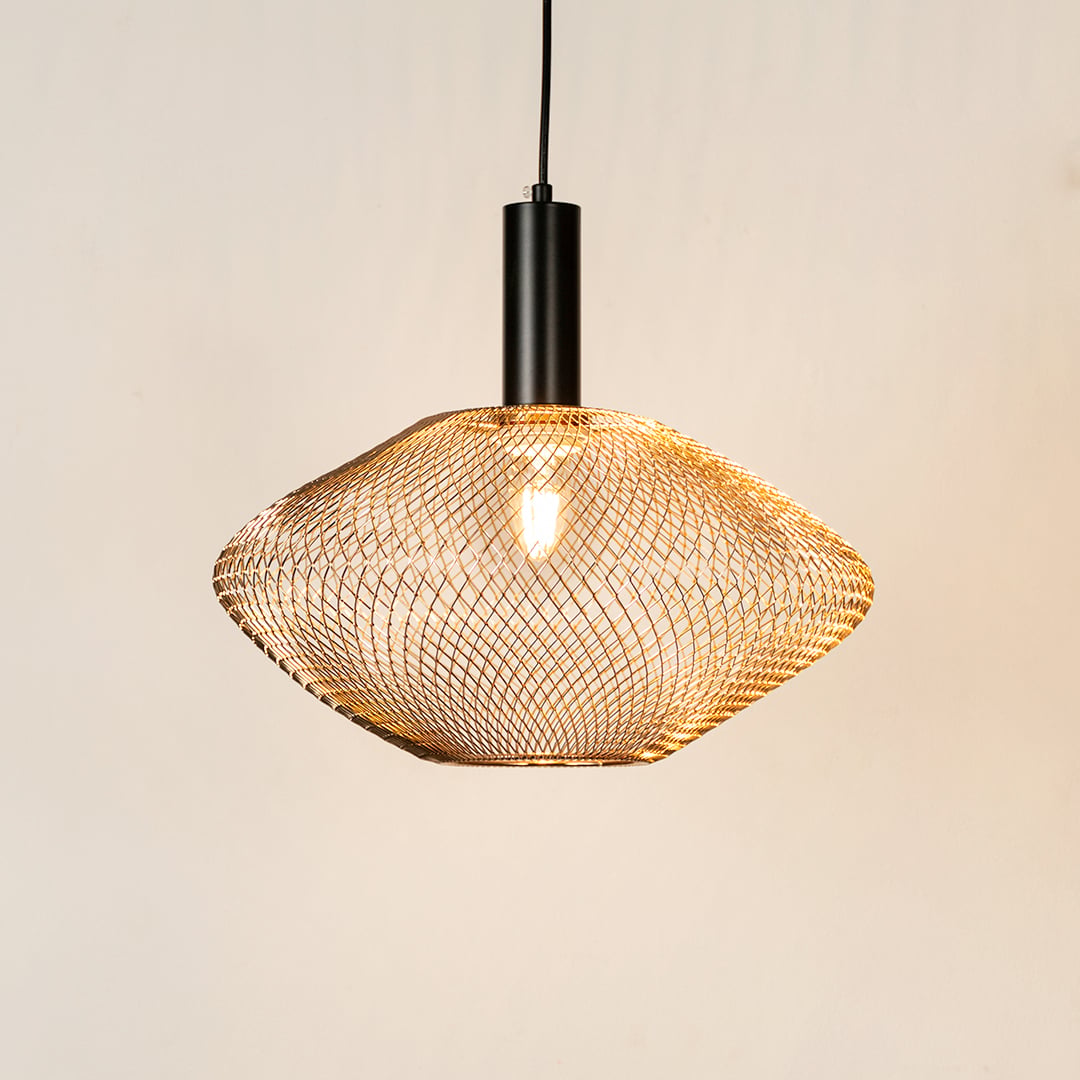 Gold metal mesh pendant light illuminated with warm glow for elegant ceiling decor.