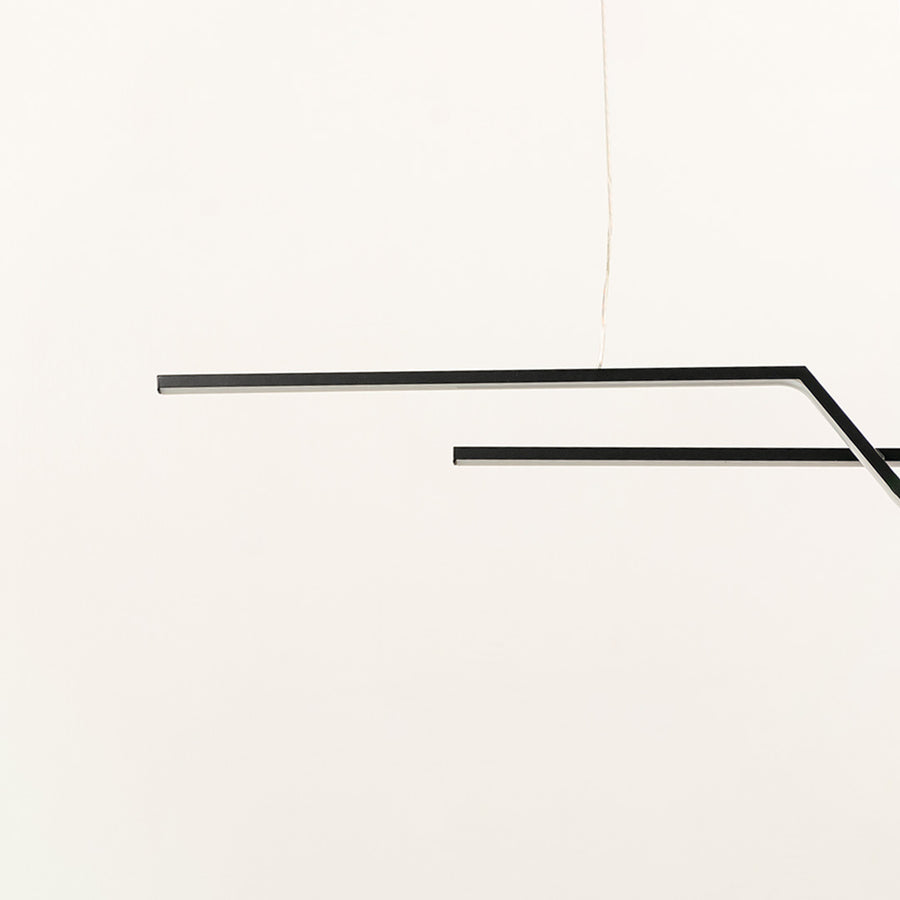 Black metal linear pendant light showcasing clean geometric lines and premium craftsmanship for modern decor lighting.