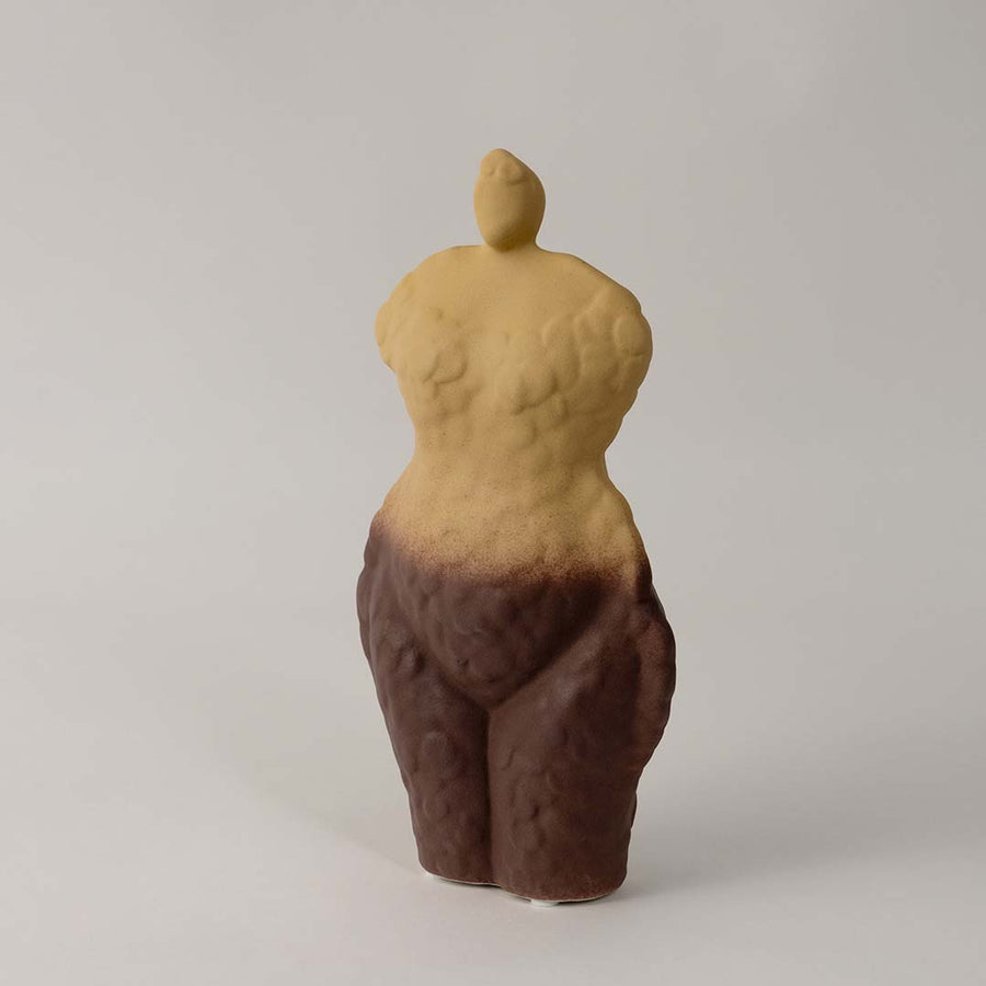 Side angle view of ceramic torso sculpture vase with contemporary artistic design styled for unique home and office interiors.