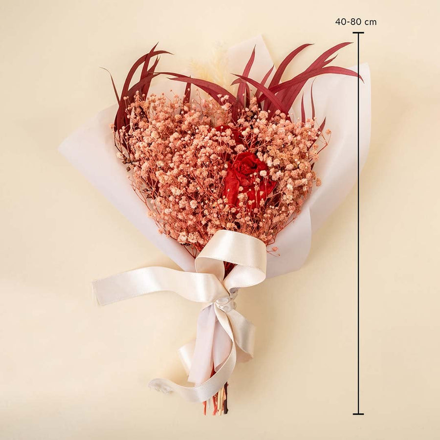 Preserved flower bouquet with red infinity rose pink babysbreath and pampas grass tied with white ribbon height 40 to 80 cm.