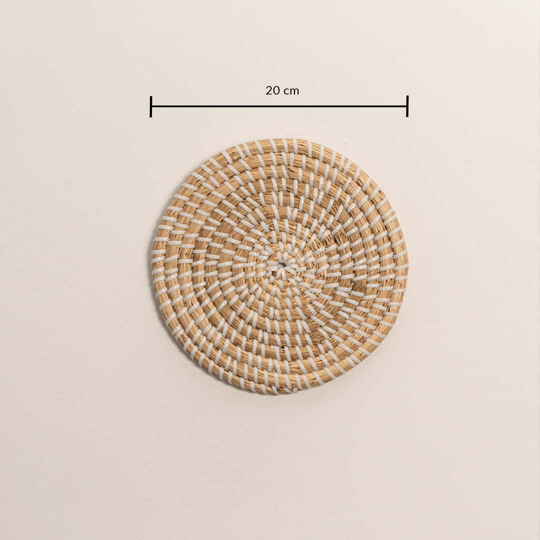 Woven wall plate with measurement of 20 cm diameter showing size reference on a clean white wall.