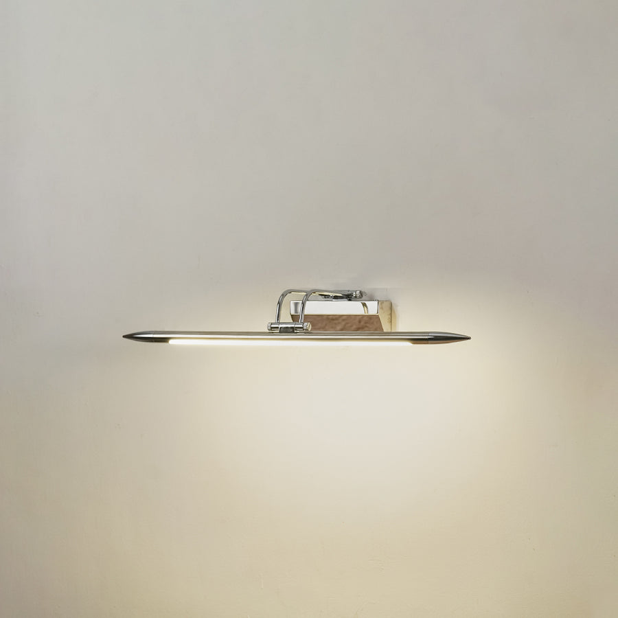Minimal wall light in chrome metal finish with linear bar design for bathroom or vanity decor lighting white background.