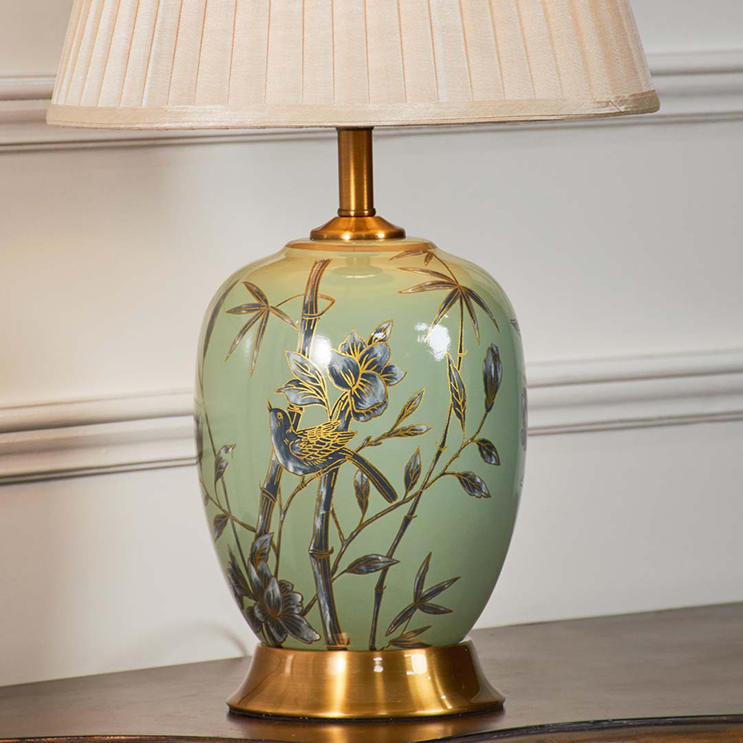 Hand painted floral ceramic table lamp base with gold accents showcasing artisan craftsmanship and timeless elegance.