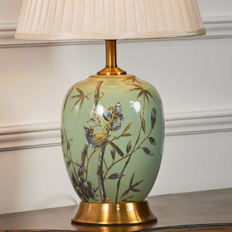 Hand painted floral ceramic table lamp base with gold accents showcasing artisan craftsmanship and timeless elegance.