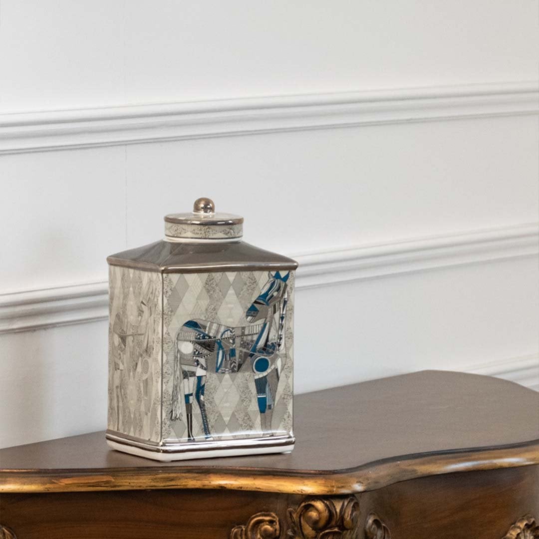 White ceramic jar with blue horse scene artwork in a front view perfect for luxury décor styling and console display placement.