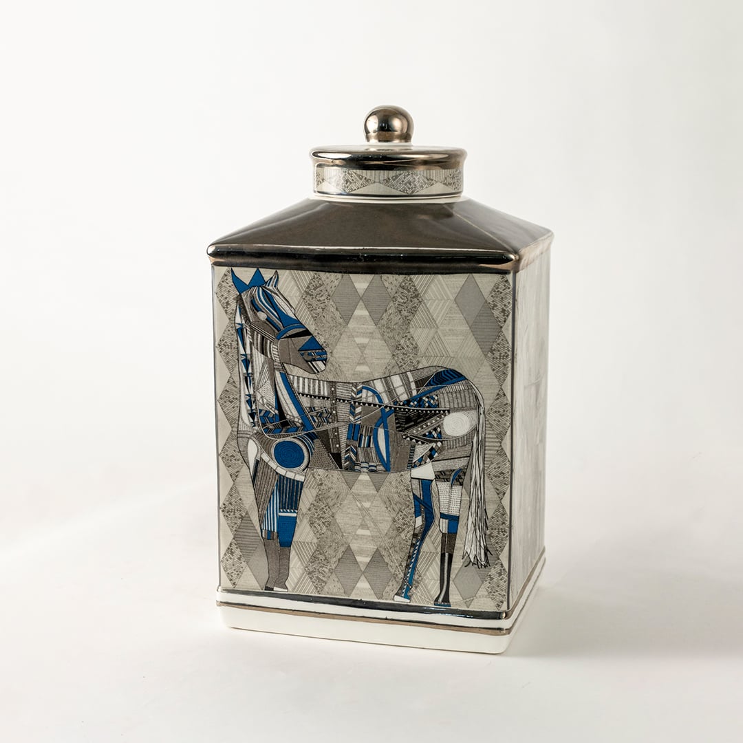 Ceramic jar with detailed blue equestrian artwork shown in a closeup view highlighting fine brush detailing premium craftsmanship and artistic décor suitable for elegant luxury home styling.
