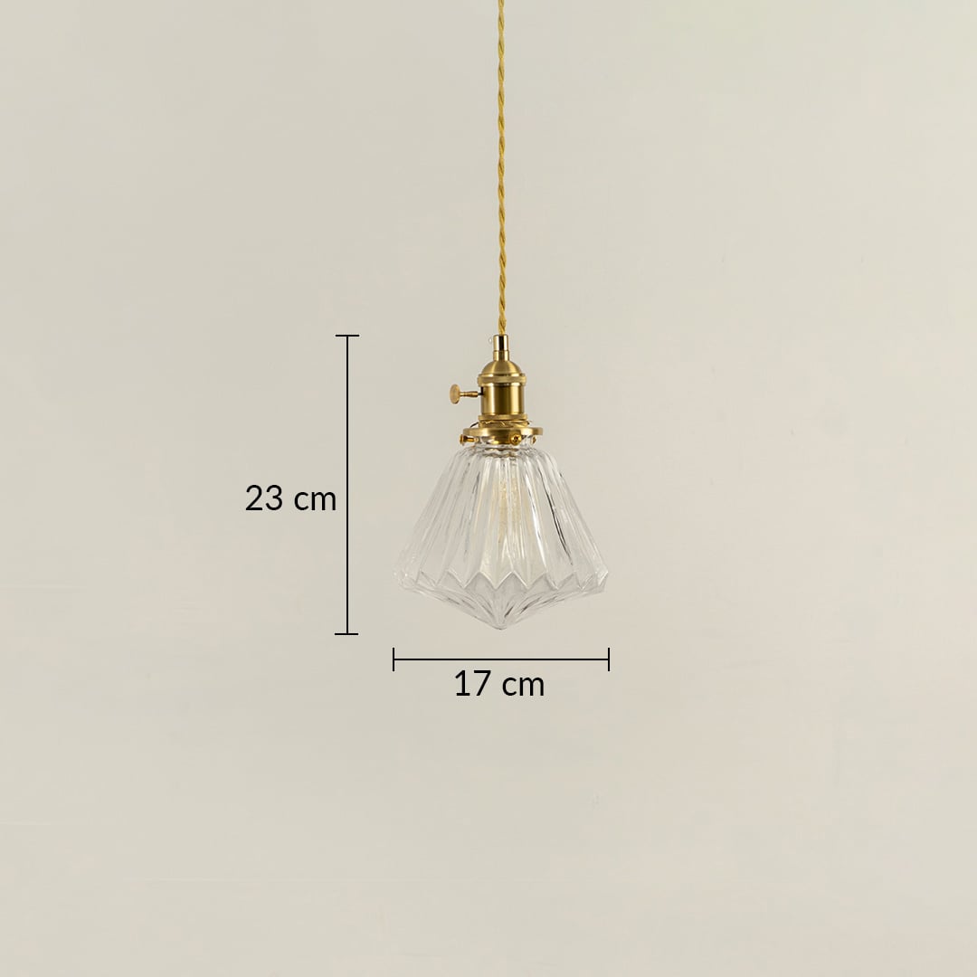 Clear glass pendant light with brass top shown with 23 cm height and 17 cm width dimension detail for decorative use.