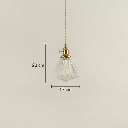 Clear glass pendant light with brass top shown with 23 cm height and 17 cm width dimension detail for decorative use.