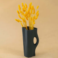 Yellow dried bunny tail grass bunch decorative artificial stems for vase and home decor styling.