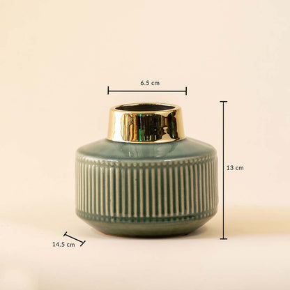 Compact ceramic decor vase shown with measurements highlighting 13 cm height 14.5 cm width and 6.5 cm opening for accurate size reference.