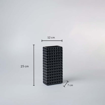 Black textured vase with measurements showing 25 cm height 12 cm width and 7 cm depth for size reference.
