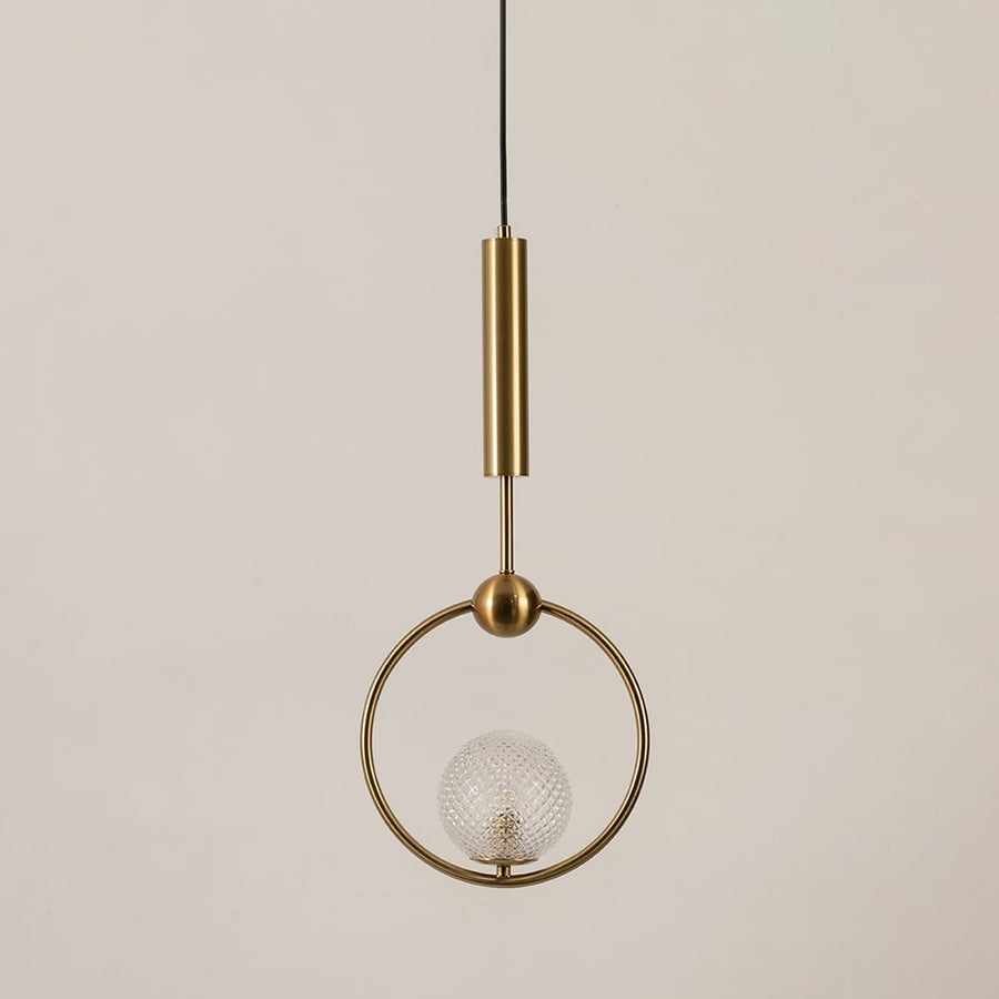Gold ring pendant light with textured glass globe displayed off on a clean white background for minimal ceiling decor.