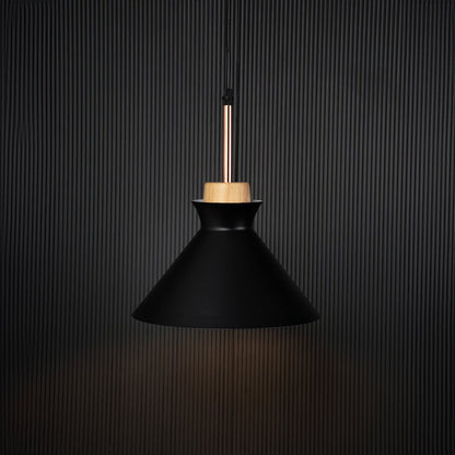 Black conical pendant ceiling light with wooden accent illuminated on back background for modern dining room cafe and living decor lighting.