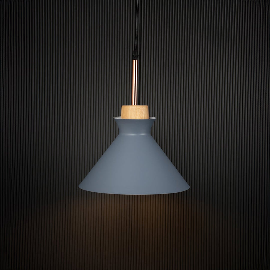 Grey conical pendant ceiling light with wooden accent illuminated on back background for dining room cafe and modern interior lighting.