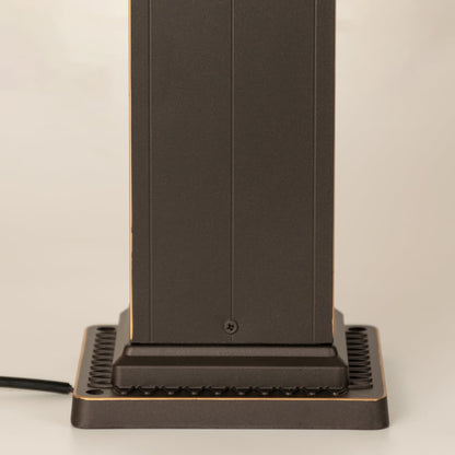 Closeup of brown decorative outdoor pillar lamp showing Chinese pattern frosted glass and clean metal detailing ideal for ambient garden lighting.