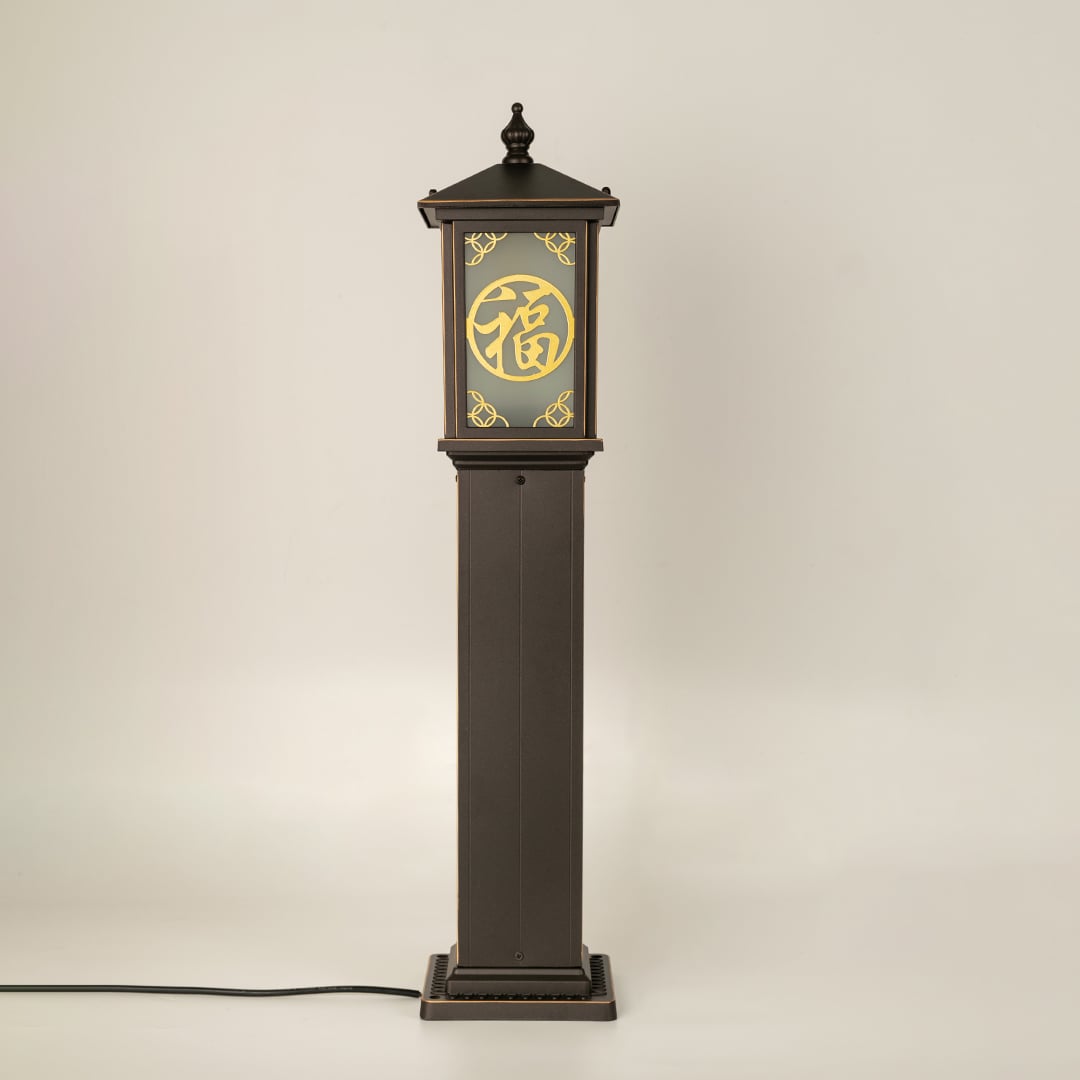 Brown pillar lamp with Chinese pattern frosted glass shown with light off on a white background displaying its detailed frame and tall column body.