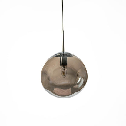 Contemporary round glass pendant light in smoky finish shown on white wall background for stylish interiors.