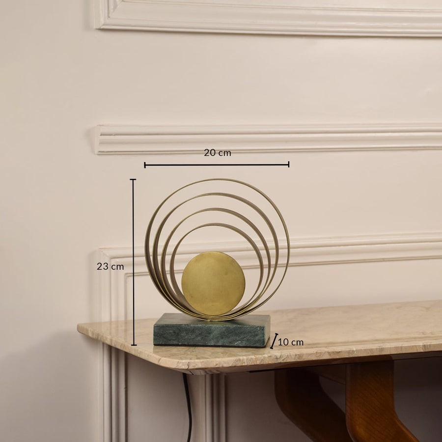 Designer brass ring table lamp measuring 23 cm in height and 20 cm in width perfect for accent lighting in elegant interior decor.