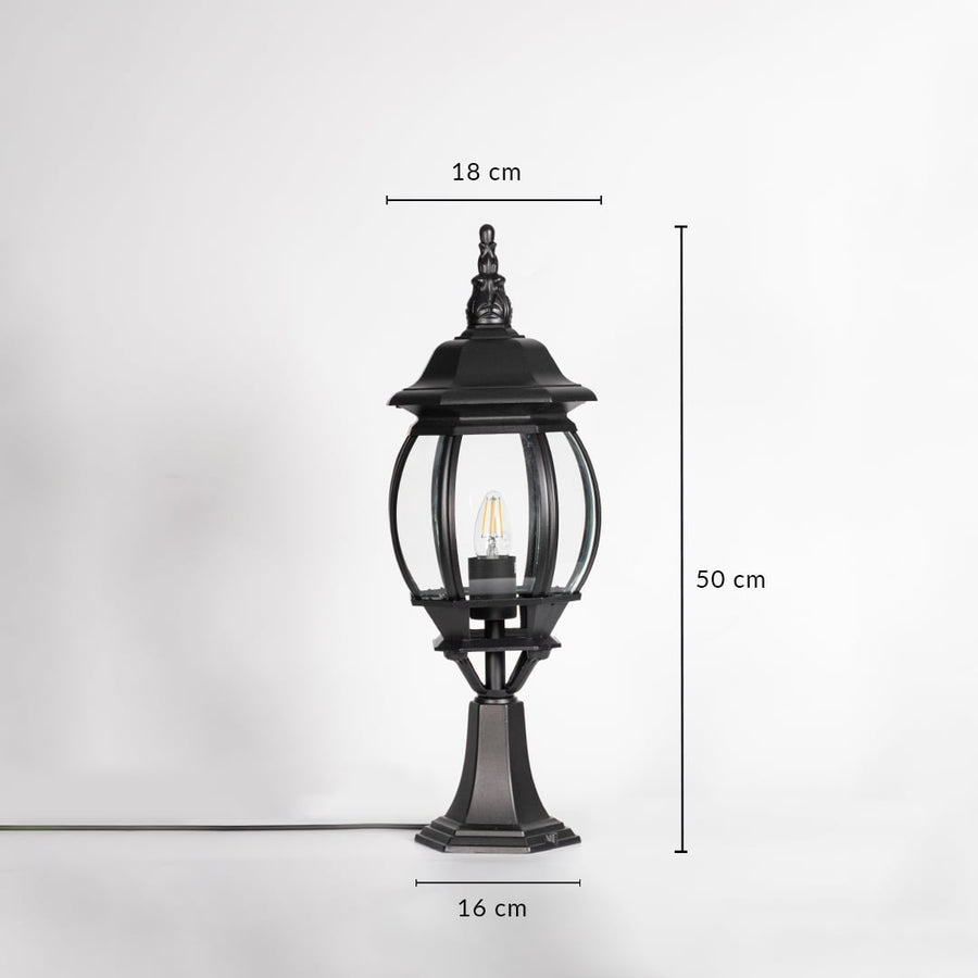 Outdoor black pillar lamp with round glass showing 50 cm height 18 cm width and 16 cm base size for villa and garden use.