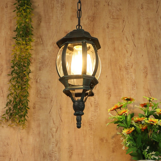 Black hanging outdoor lantern light styled beautifully adding charm and soft glow to outdoor decor.