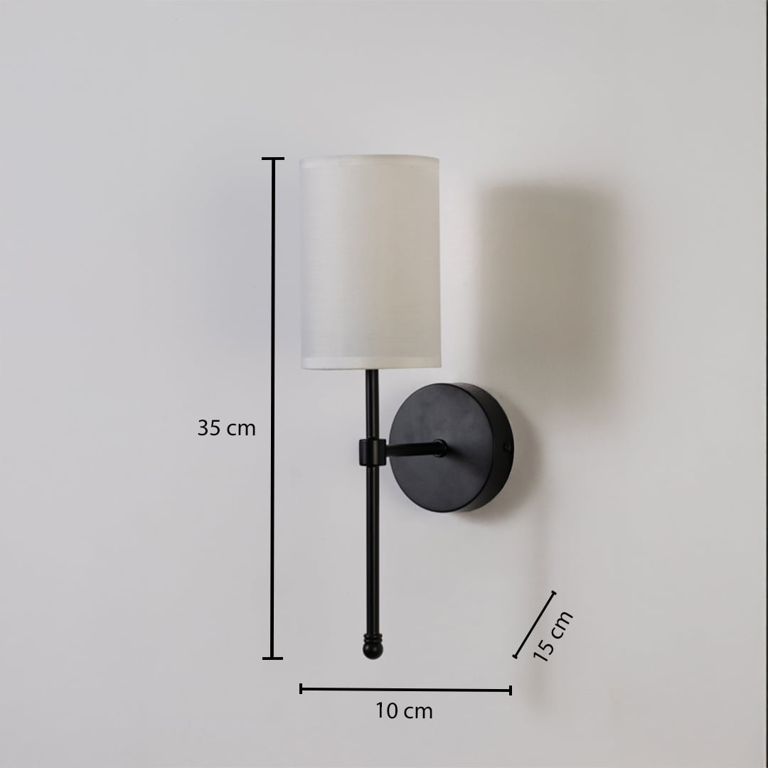 Black metal wall light with white fabric shade shown with 35 cm height 10 cm width and 15 cm depth for accurate indoor wall placement.