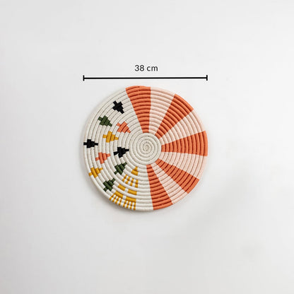 Cotton woven wall plate with orange and cream design displayed on a white background showing 38 cm dimensions for accurate wall decor sizing.
