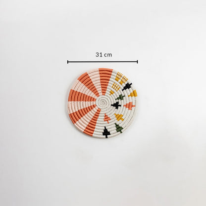 A multicolor woven wall plate measuring 31 cm in diameter displayed on a white background highlighting its size and detailed handcrafted pattern.