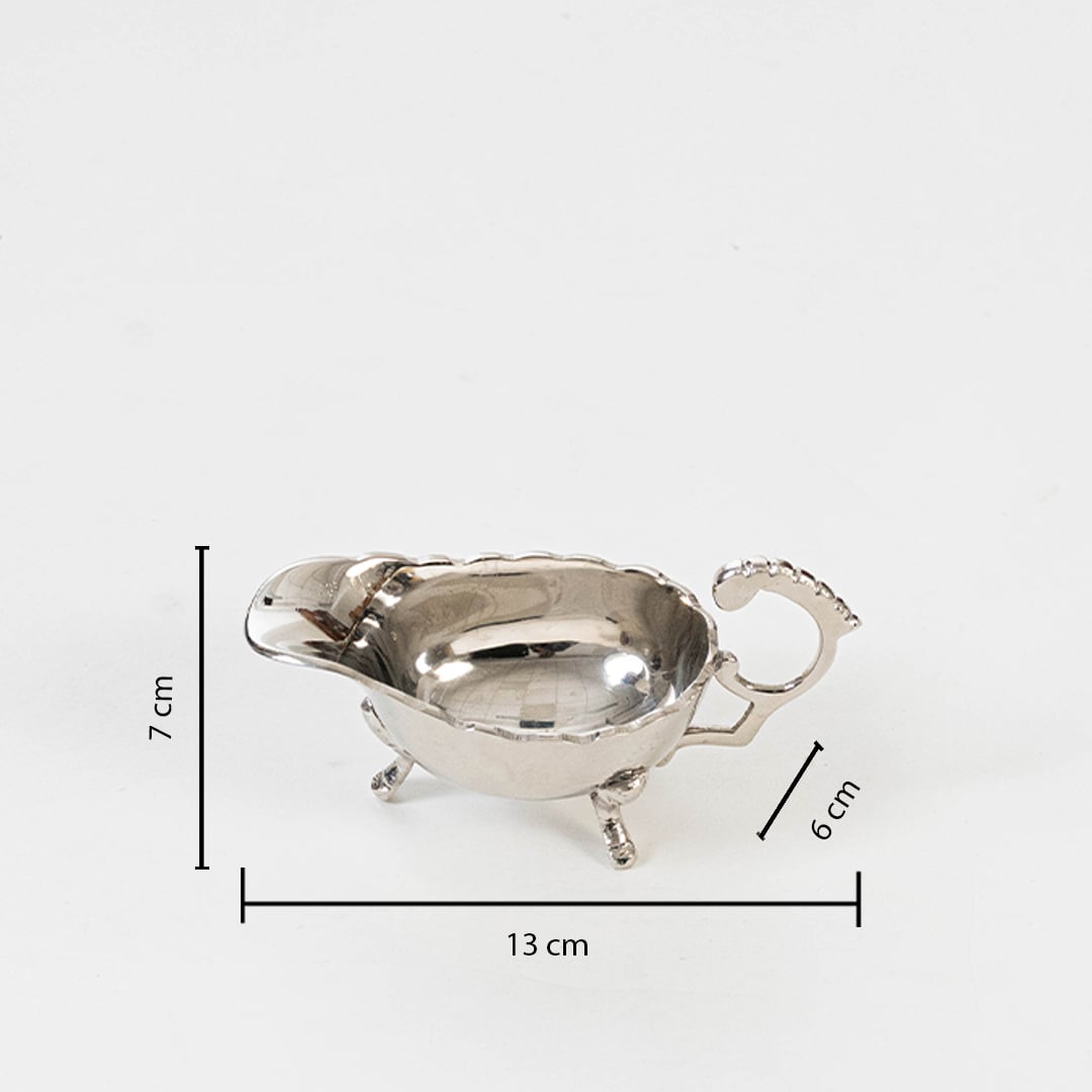 Silver gravy boat shown with labeled dimensions 7 cm height 17 cm length and 6 cm width on clean white background.