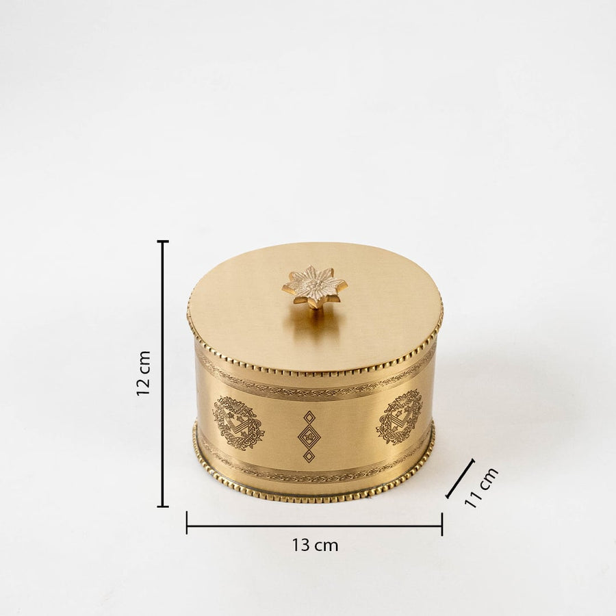 A brass storage box on a white background with clearly marked dimensions showing 13 cm width 11 cm depth and 12 cm height highlighting its compact form.