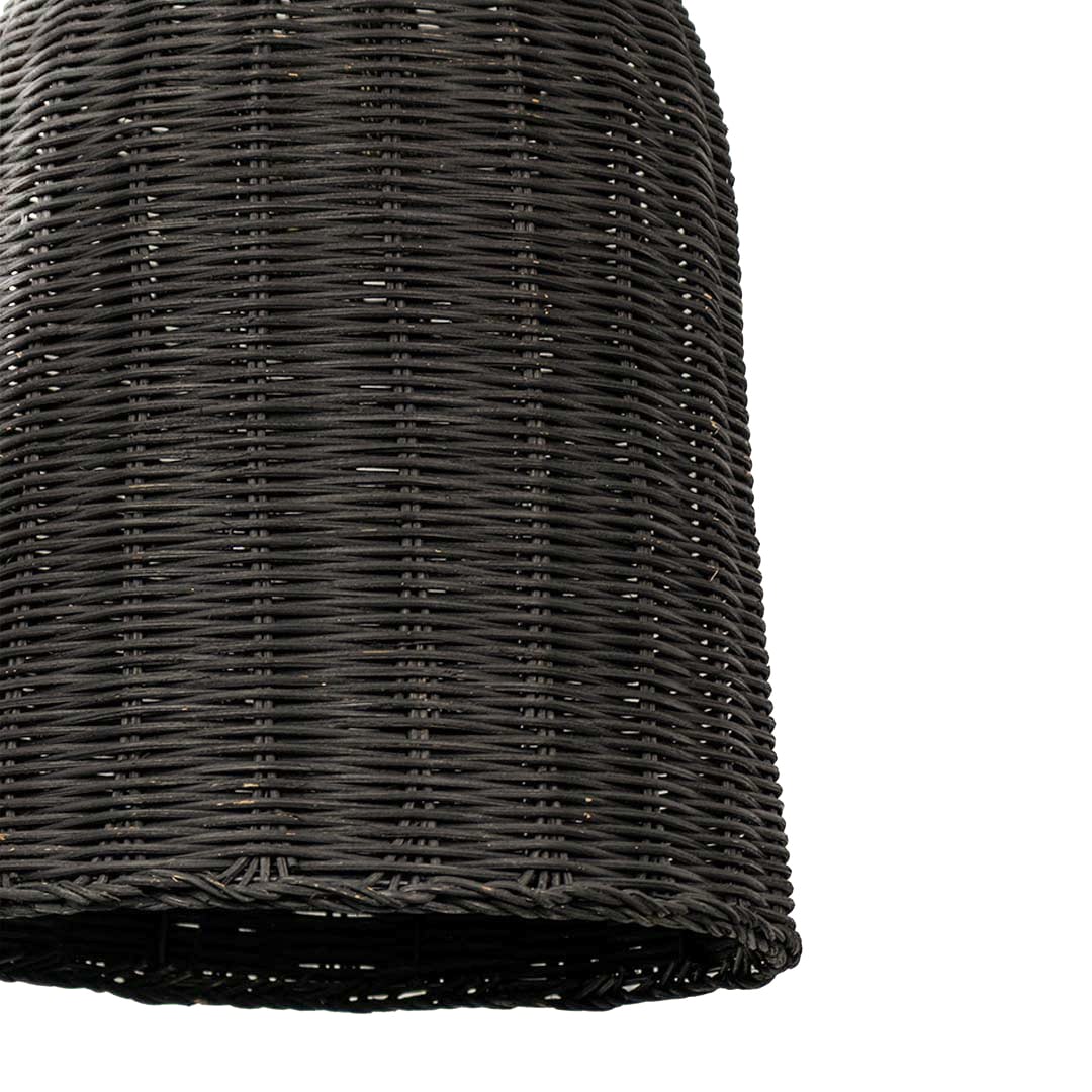 Closeup of black rattan pendant light showing detailed woven texture and smooth hand-finished curves.