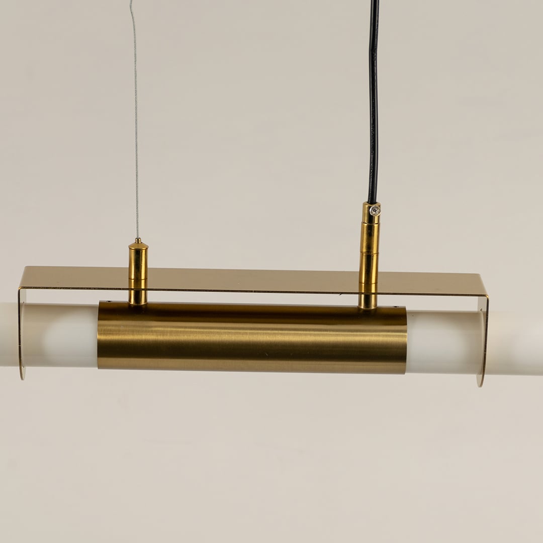 Gold metal linear LED pendant light highlighting refined metal construction and contemporary minimalist lighting design.