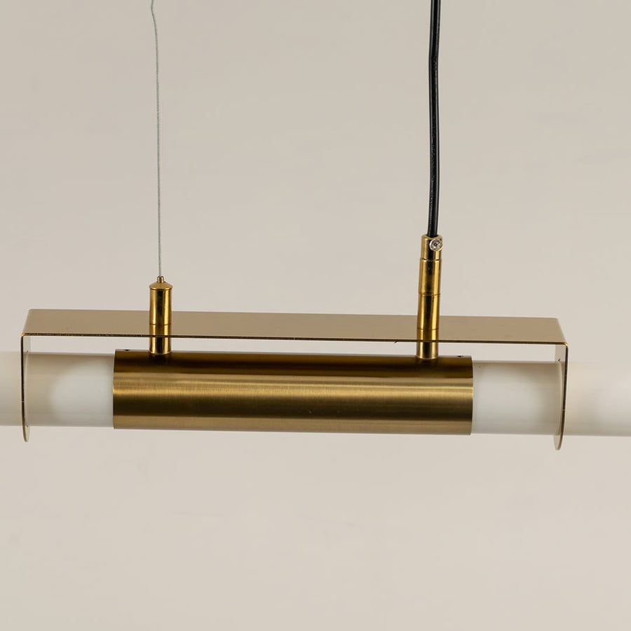 Gold metal linear LED pendant light highlighting refined metal construction and contemporary minimalist lighting design.
