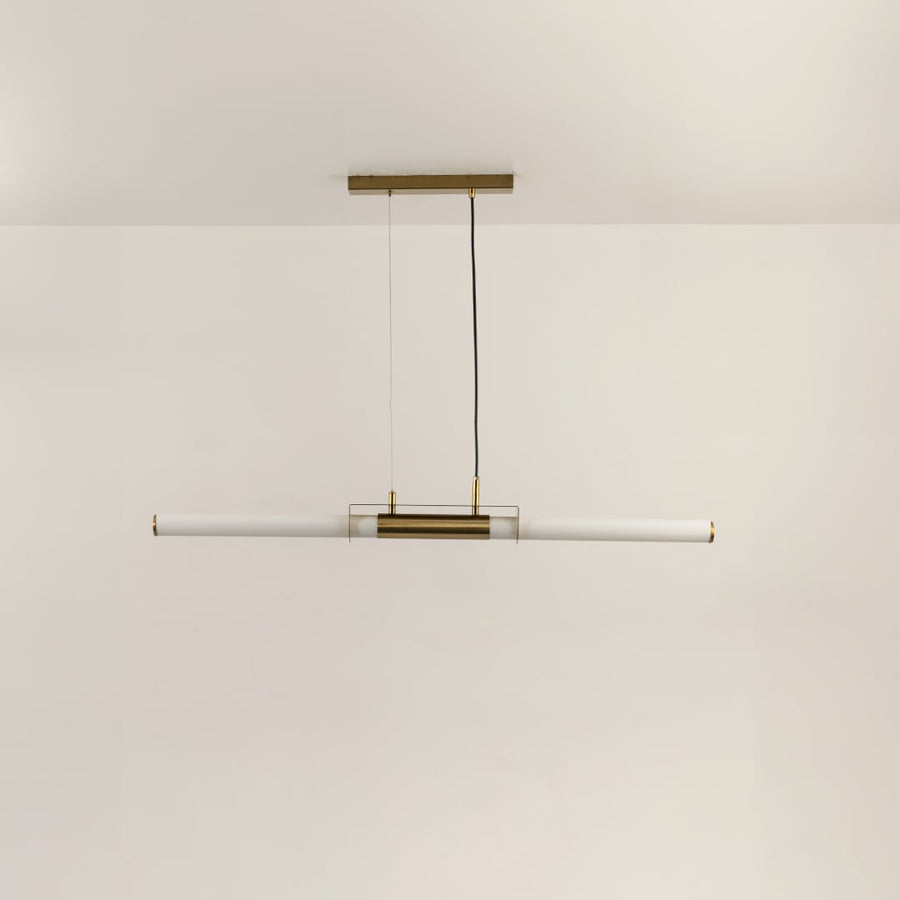 Gold metal linear LED pendant light with integrated illumination designed for elegant modern ceiling lighting indoors.