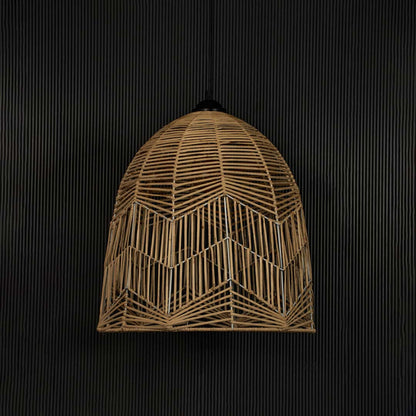 Bamboo pendant light on black background highlighting its geometric weave and earthy natural tone.